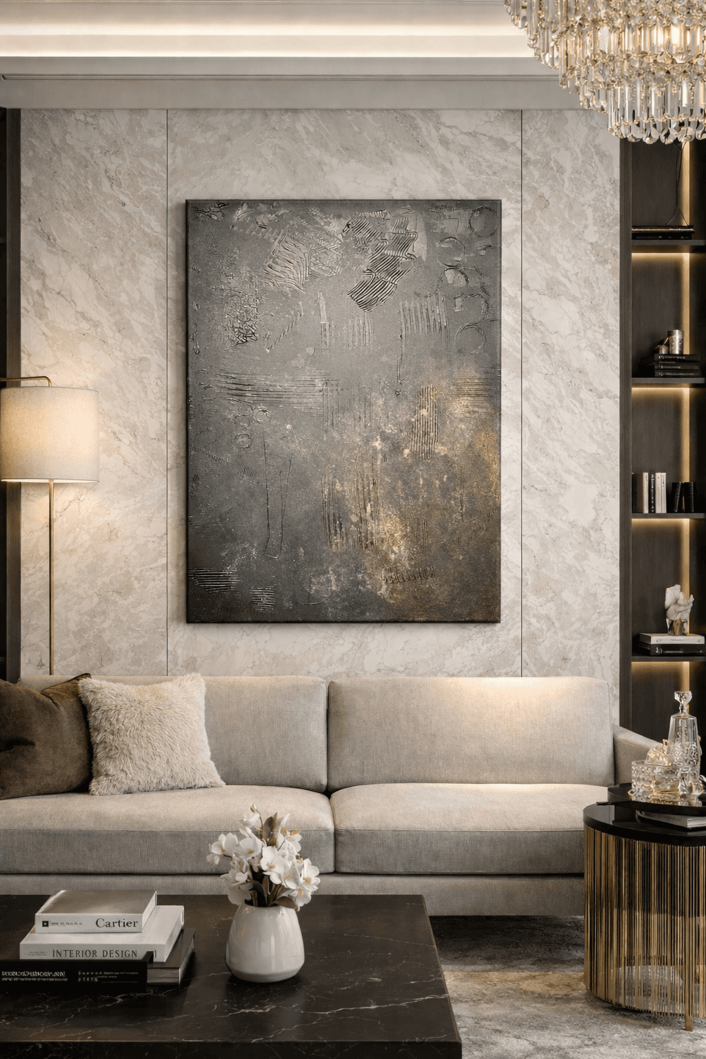 Silent Alchemy, a gray and silver textured abstract painting with gold accents by Julia Mindar, shown in a marble living room